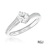 The Dursey Platinum 0.22ct Round Brilliant Cut Diamond Solitaire Engagement Ring With 0.10ct Diamond Set Shoulders