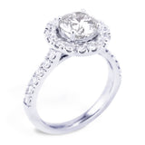 The Rosalia Platinum Round Brilliant Cut Diamond Engagement Ring With Diamond Halo And Diamond Set Shoulders