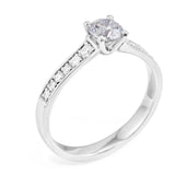 The Cassia Platinum 0.50ct Round Brilliant Cut Diamond Solitaire Engagement Ring With 0.22ct Diamond Set Shoulders
