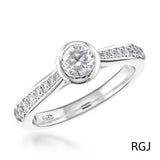 The Memoire Saona Platinum 0.41ct Round Brilliant Cut Diamond Solitaire Engagement Ring With 0.14ct Diamond Set Shoulders