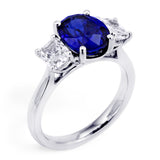 Platinum 3.16ct Oval Cut Sapphire And 1.06ct Radiant Cut Diamond Three Stone Ring
