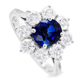 18ct White Gold 1.70ct Oval Cut Blue Sapphire And 1.65ct Round Brilliant Cut Diamond Halo Cluster Ring