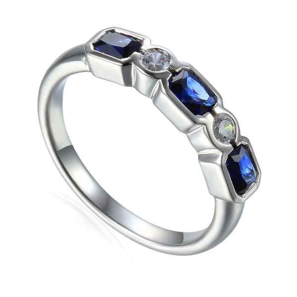 18ct White Gold 0.89ct Octagon Cut Blue Sapphire And 0.11ct Round Brilliant Cut Diamond Five Stone Ring