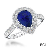 The Evie Platinum 0.77ct Pear Cut Blue Sapphire Ring With 0.44ct Diamond Halo And Diamond Set Shoulders