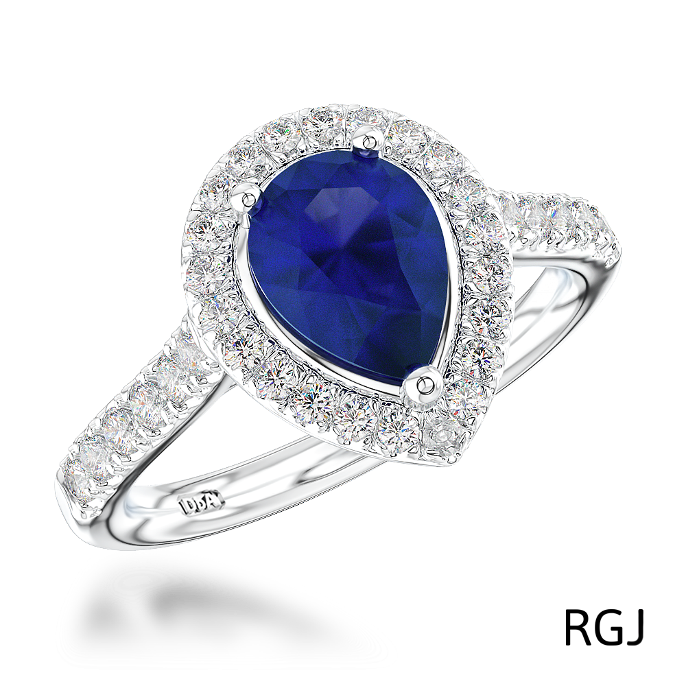 The Skye Platinum 1.01ct Pear Cut Blue Sapphire Ring With 0.34ct Diamond Halo And Diamond Set Shoulders