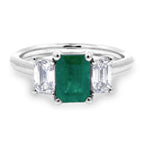 Platinum 0.95ct Emerald Cut Emerald And 0.60ct Emerald Cut Diamond Three Stone Ring
