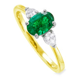 Platinum And 18ct Yellow Gold 0.78ct Oval Cut Emerald And 0.27ct Pear Cut Diamond Three Stone Engagement Ring