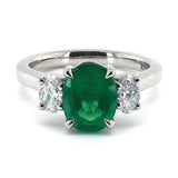 Platinum 1.34ct Oval Cut Emerald And 0.46ct Oval Cut Diamond Three Stone Ring