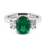 Platinum 1.34ct Oval Cut Emerald And 0.46ct Oval Cut Diamond Three Stone Ring