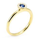 18ct Yellow Gold 0.20ct Sapphire And 0.07ct Diamond Halo Ring