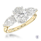 18ct Yellow Gold 1.00ct Oval And 0.57ct Pear Cut Laboratory Grown Diamond Three Stone Engagement Ring