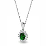 18ct White Gold 0.40ct Oval Cut Emerald And 0.14ct Diamond Cluster Necklace