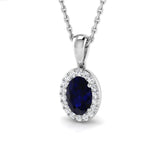 18ct White Gold 0.59ct Oval Cut Blue Sapphire And 0.08ct Diamond Halo Necklace