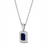 18ct White Gold 0.35ct Emerald Cut Blue Sapphire And 0.09ct Diamond Halo Necklace