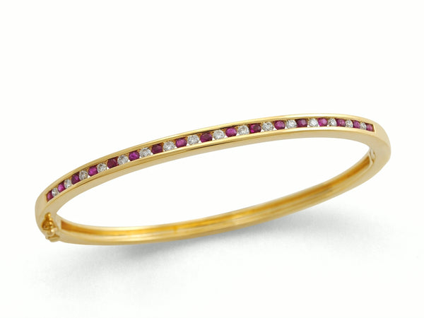9ct Yellow Gold 0.69ct Ruby And 0.46ct Diamond Channel Set Bangle