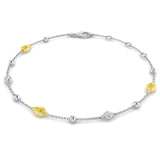 9ct White And Yellow Gold 0.24ct Pear Cut Yellow Diamond And 0.05ct Diamond Station Bracelet