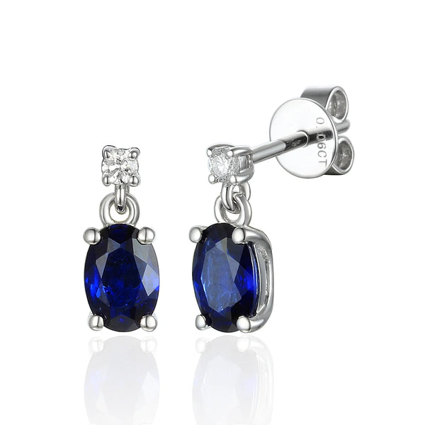 18ct White Gold 1.28ct Oval Cut Blue Sapphire And 0.06ct Diamond Drop Earrings