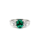 Platinum 1.18ct Emerald And 0.50ct Diamond Laboratory Grown Three Stone Ring