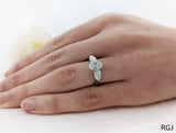 Platinum 1.08ct Oval And 0.57ct Pear Cut Laboratory Grown Diamond Three Stone Engagement Ring
