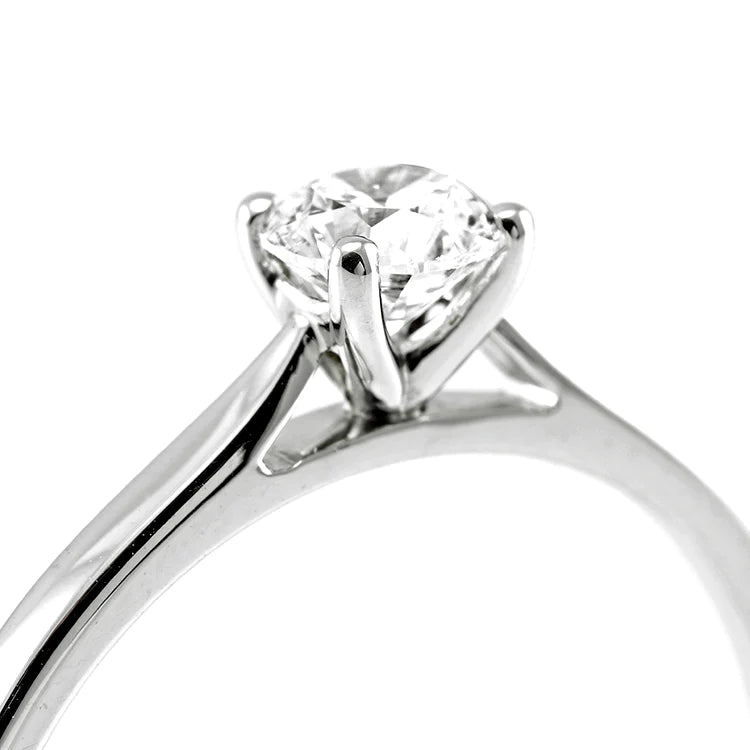 The Magnolia Platinum Round Brilliant Cut Diamond Solitaire Non Certificated Engagement Ring