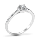 The Buttercup Platinum 0.10ct Round Brilliant Cut Diamond Halo Engagement Ring With 0.15ct Diamond Set Shoulders