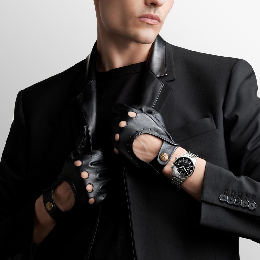 longines legend diver 39mm black dial automatic watch on man's wrist lifestyle image