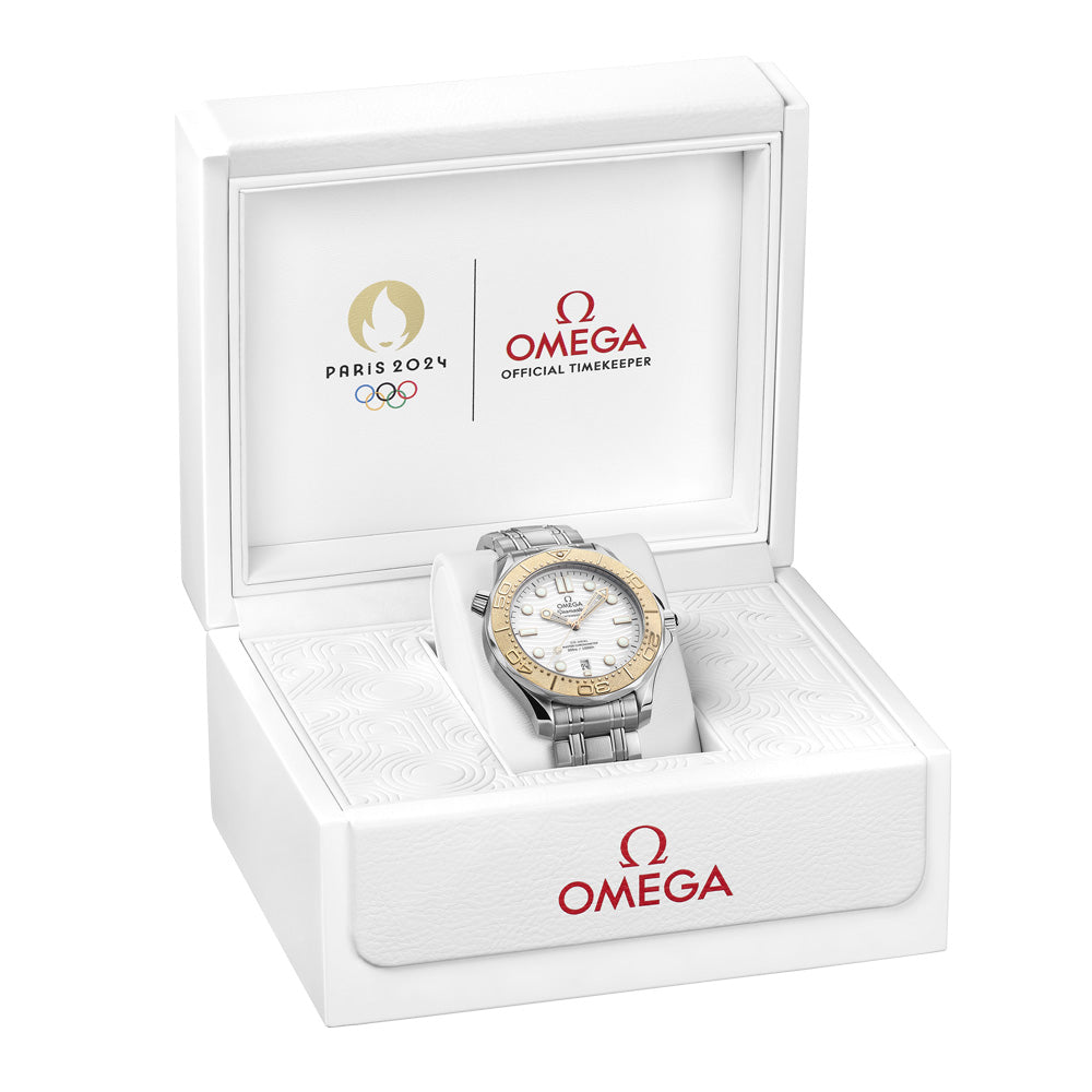 omega seamaster diver 300m paris olympics 2024 edition 42mm white dial automatic 18ct yellow gold and steel on steel bracelet gents watch in a presentation box image