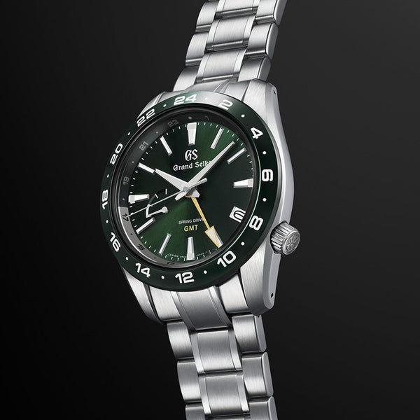grand seiko sports collection spring drive gmt 44.5mm green dial stainless steel gents watch front side facing image