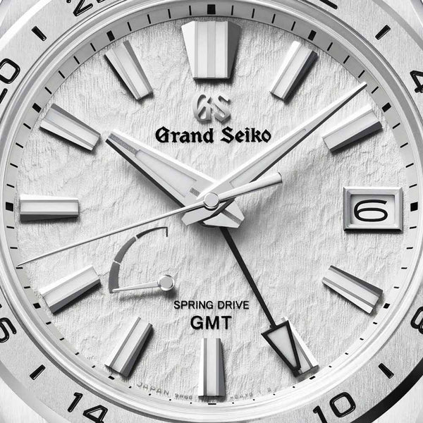 grand seiko evolution 9 mistflake spring drive gmt 41mm grey dial titanium gents watch dial close up