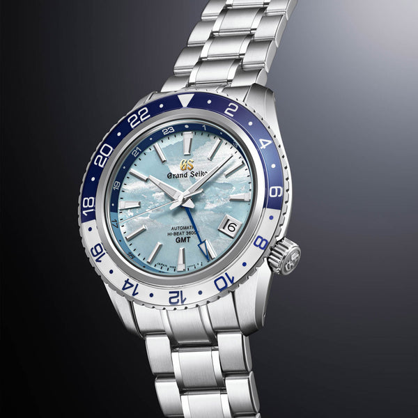 grand seiko unkai sea of clouds hi-beat gmt limited edition 40mm sky blue dial automatic watch on a steel bracelet front side facing upright image