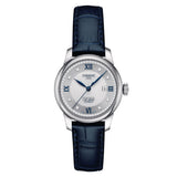 tissot le locle automatic lady 20th anniversary 29mm silver diamond dot dial stainless steel watch on a blue leather strap front facing upright image