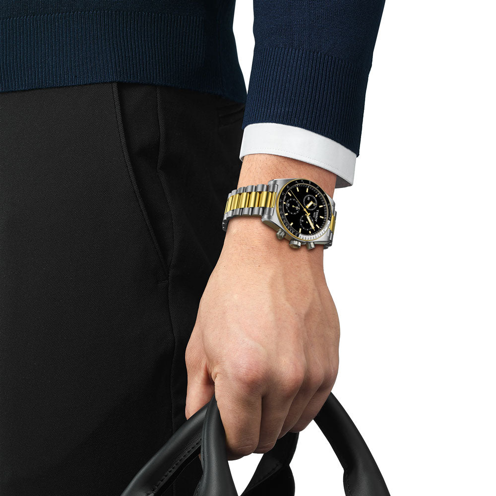 tissot pr516 40mm black dial bi-colour quartz chronograph watch lifestyle image