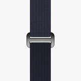 tudor pelagos fxd chrono 43mm blue dial black carbon composite on fabric strap automatic chronograph watch showing one piece blue fabric strap