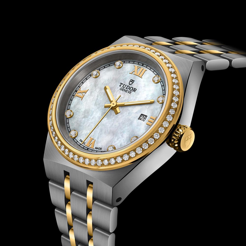 tudor royal 28mm mother of pearl diamond dot dial gold diamond bezel and steel on gold and steel bracelet automatic watch lifestyle image