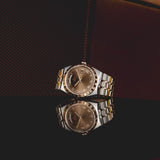 tudor royal 41mm chocolate brown dial gold and steel on gold and steel bracelet automatic watch lifestyle image