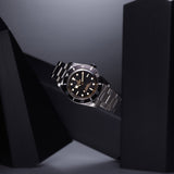 tudor black bay 54 37mm black dial steel on steel bracelet automatic watch lifestyle image