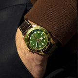 tudor black bay 58 18K 39mm green dial gold on leather strap automatic watch lifestyle image
