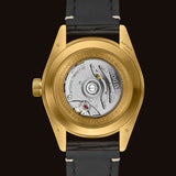 tudor black bay 58 18K 39mm green dial gold on leather strap automatic watch showing transparent caseback