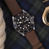tudor black bay 58 39mm black dial steel on leather strap automatic watch lifestyle image