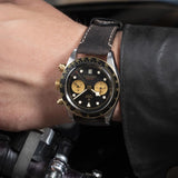 tudor black bay chrono s&g 41mm black dial gold and steel on leather strap automatic chronograph watch lifestyle image