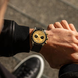 tudor black bay chrono s&g 41mm champagne dial gold and steel on fabric strap automatic chronograph watch lifestyle image