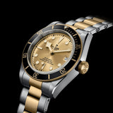 tudor black bay s&g 41mm champagne dial gold and steel on gold and steel bracelet automatic watch lifestyle image