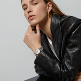 gucci g-timeless 29mm mop diamond dot dial ladies quartz watch on stainless steel bracelet lifestyle image