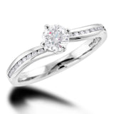 The Rose Platinum 0.50ct Round Brilliant Cut Diamond Solitaire Engagement Ring With 0.10ct Channel Set Diamond Shoulders