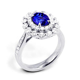 18ct White Gold 2.30ct Oval Cut Blue Sapphire And 1.09ct Double Diamond Halo Ring
