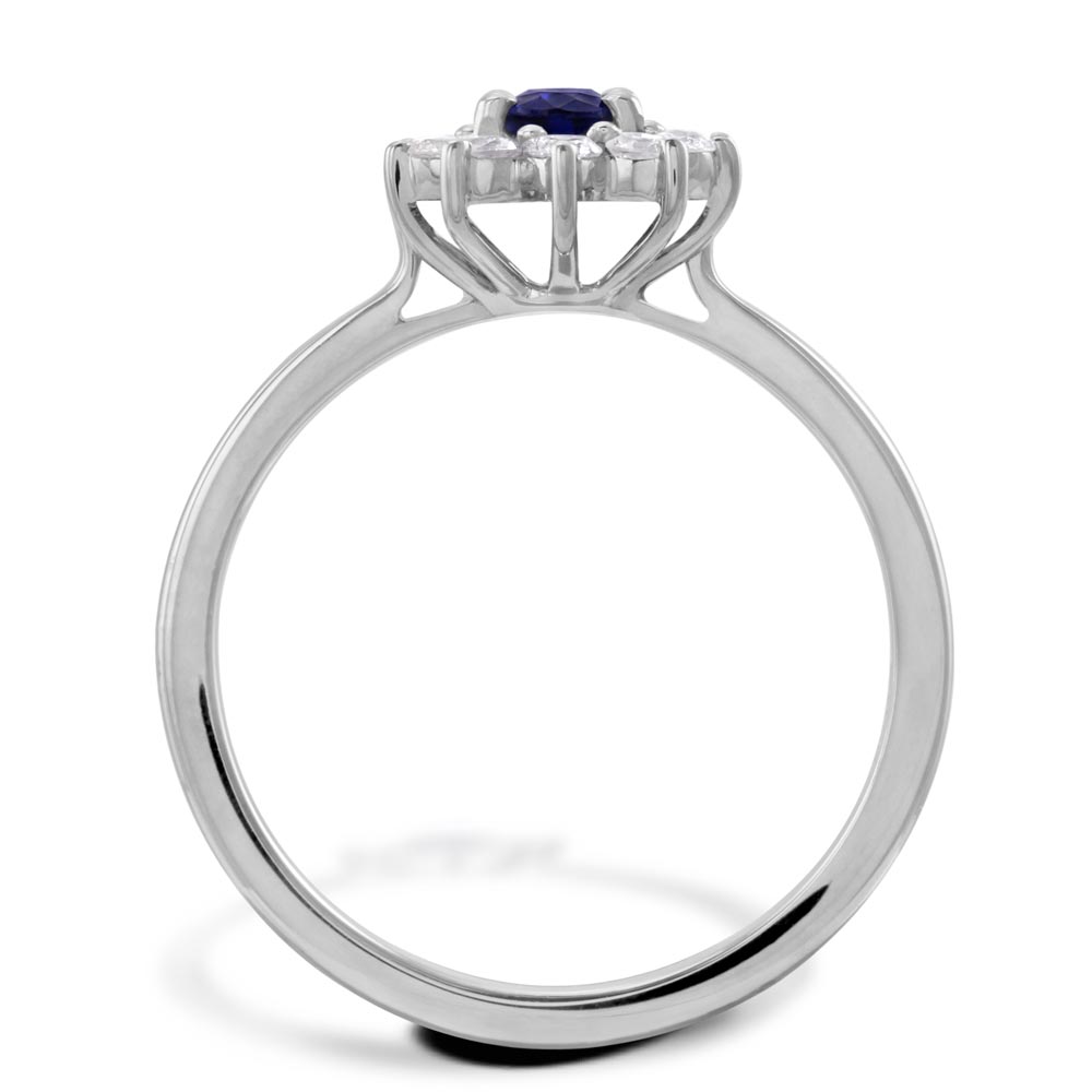 18ct White Gold 0.35ct Oval Cut Blue Sapphire And 0.27ct Round Brilliant Cut Diamond Halo Cluster Ring