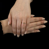 18ct rose gold 1.63ct emerald cut morganite and 0.31ct round brilliant cut diamond three stone ring model shot