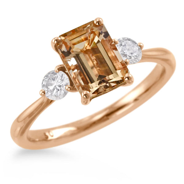18ct rose gold 1.63ct emerald cut morganite and 0.31ct round brilliant cut diamond three stone ring