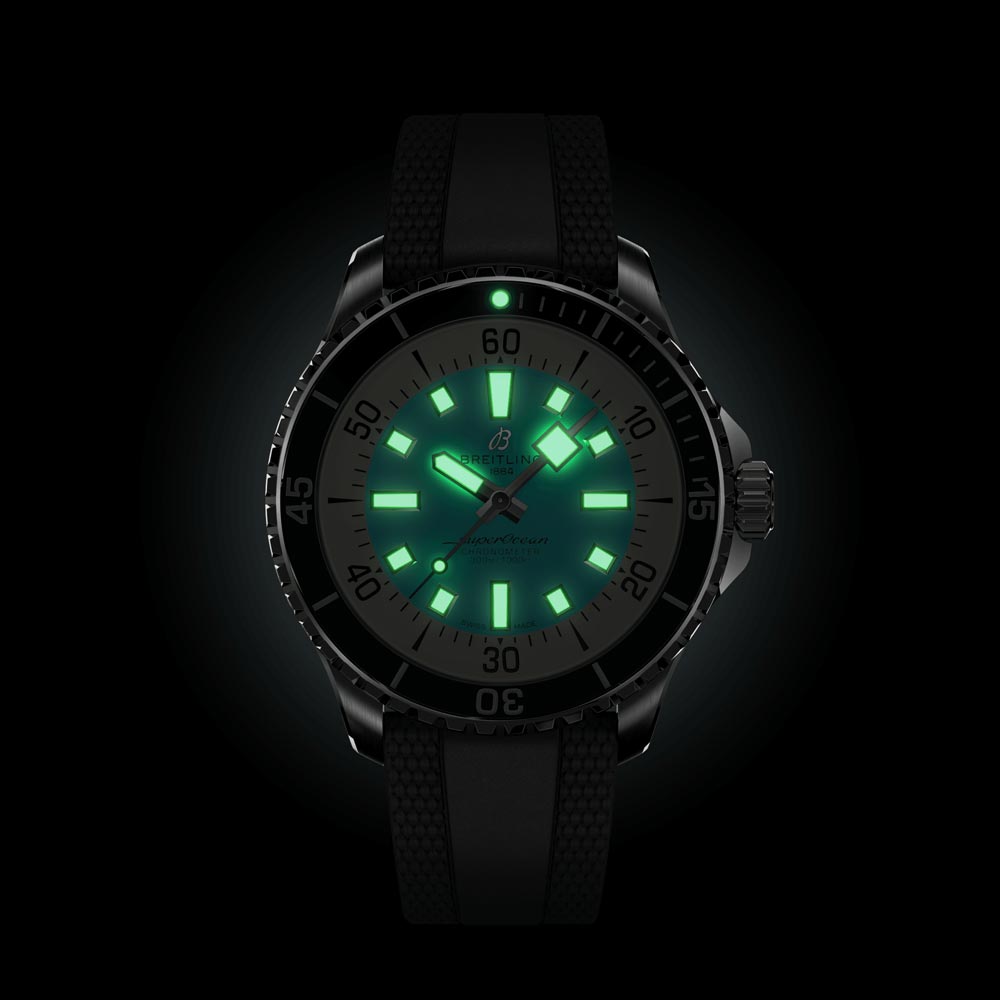 breitling superocean 44mm turquoise dial automatic gents watch in the dark shot