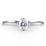 The Lotus Platinum 0.27ct Round Brilliant Cut Diamond Solitaire Engagement Ring
